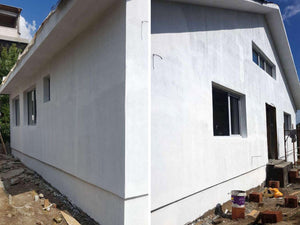 Application d'un revêtement d'apprêt pour la façade du projet de maison en métal à Craiova thumbnail