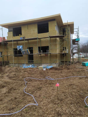 Construction d'une maison à étages avec isolation thermique en laine de roche pour les façades thumbnail