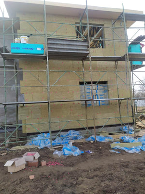 Construction d'une maison à étages avec isolation thermique en laine de roche pour les façades thumbnail