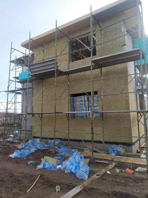 Construction d'une maison à étages avec isolation thermique en laine de roche pour les façades thumbnail