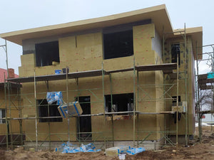 Construction d'une maison à étages avec isolation thermique en laine de roche pour les façades thumbnail