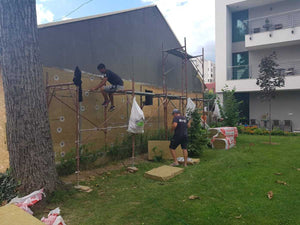 Application de mastic pour la façade du projet de maison en métal à Craiova thumbnail