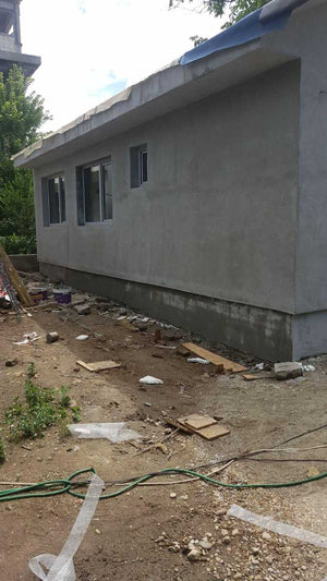 Application de mastic pour la façade du projet de maison en métal à Craiova thumbnail