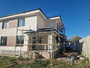 Application de revêtements décoratifs en briques apparentes pour une maison métallique thumbnail