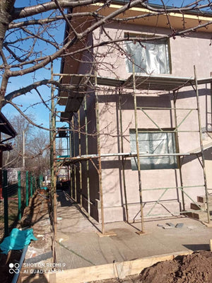 Application de treillis en fibre de verre avec adhésif et mastic pour la maison à Snagov thumbnail