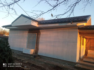 Application d'un revêtement d'apprêt et d'enduit décoratif structuré thumbnail