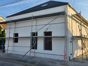 Application d'enduit décoratif pour la maison en métal de 191 mètres carrés à Sibiu thumbnail