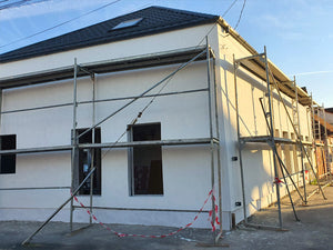Application d'enduit décoratif pour la maison en métal de 191 mètres carrés à Sibiu thumbnail
