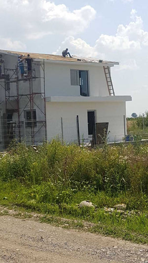 Application d'enduit décoratif siliconé pour la maison en métal à Domnesti thumbnail