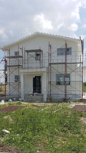 Application d'enduit décoratif siliconé pour la maison en métal à Domnesti thumbnail