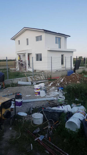 Application d'enduit décoratif siliconé pour la maison en métal à Domnesti thumbnail