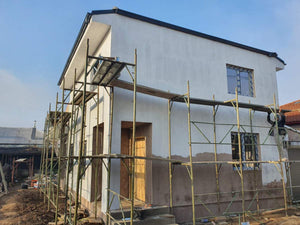 Application d'enduit décoratif structuré pour la construction de la maison thumbnail