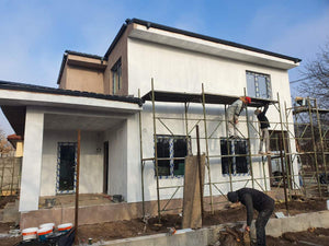 Application d'enduit décoratif structuré pour la construction de la maison thumbnail