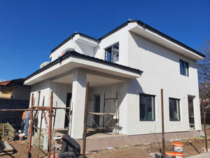 Application d'enduit décoratif structuré pour la construction de la maison thumbnail
