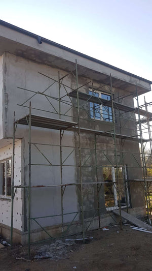 Application de mastic pour le projet de maison de 155 mètres carrés thumbnail