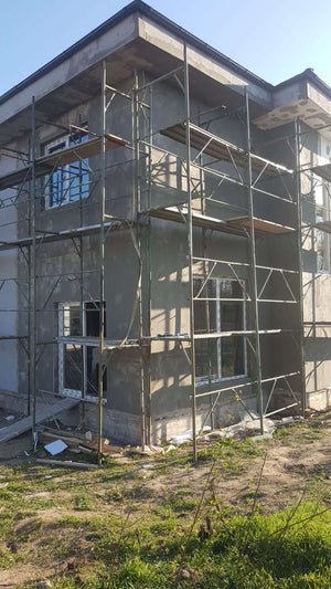 Application de mastic pour le projet de maison de 155 mètres carrés thumbnail