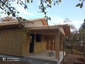 Maison de plain-pied à Sinesti application d'une isolation thermique en laine de roche pour l'extérieur thumbnail