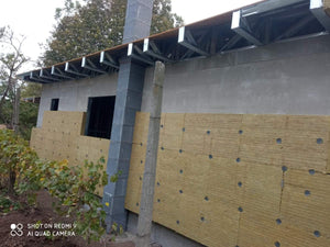 Maison de plain-pied à Sinesti application d'une isolation thermique en laine de roche pour l'extérieur thumbnail