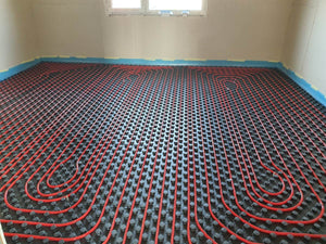 Maison sur un squelette métallique étape de montage du chauffage par le sol thumbnail