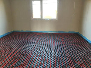 Maison sur un squelette métallique étape de montage du chauffage par le sol thumbnail