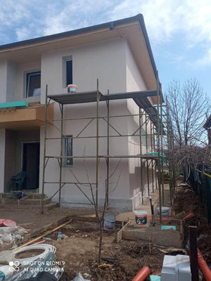 Maison sur structure métallique, finition des façades avec enduit décoratif extérieur thumbnail