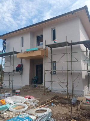 Maison sur structure métallique, finition des façades avec enduit décoratif extérieur thumbnail