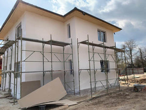 Maison sur structure métallique, finition des façades avec enduit décoratif extérieur thumbnail