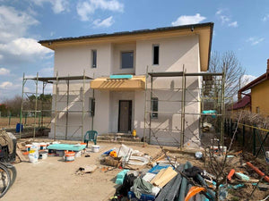 Maison sur structure métallique, finition des façades avec enduit décoratif extérieur thumbnail