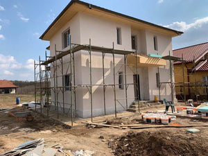 Maison sur structure métallique, finition des façades avec enduit décoratif extérieur thumbnail