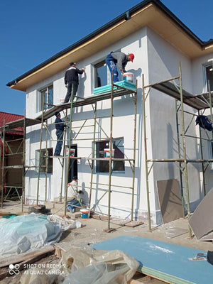 Maison sur structure métallique, finition des façades avec enduit décoratif extérieur thumbnail