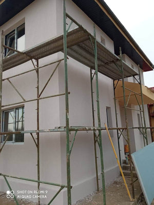 Maison sur structure métallique, finition des façades avec enduit décoratif extérieur thumbnail