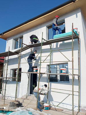 Maison sur structure métallique, finition des façades avec enduit décoratif extérieur thumbnail