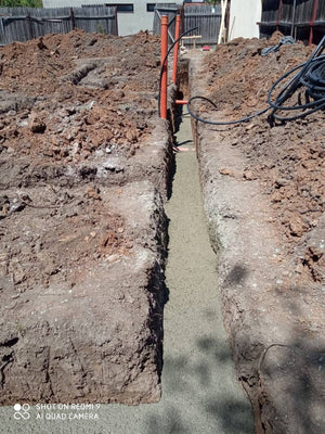 Construction d'une maison de 116 mètres carrés, coulée de la semelle de fondation en béton B250 thumbnail