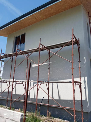 Construction d'une maison avec façades finalisées avec enduit décoratif extérieur thumbnail