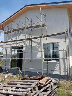 Construction d'une maison avec façades finalisées avec enduit décoratif extérieur thumbnail