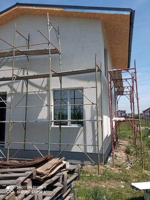 Construction d'une maison avec façades finalisées avec enduit décoratif extérieur thumbnail
