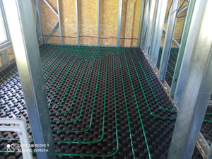 Construction d'une maison avec système de chauffage par le sol au rez-de-chaussée et à l'étage thumbnail