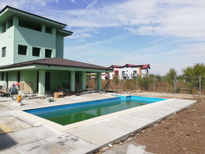 Construction d'une piscine de 48 mètres carrés pour un projet de maison thumbnail