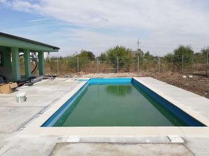 Construction d'une piscine de 48 mètres carrés pour un projet de maison thumbnail