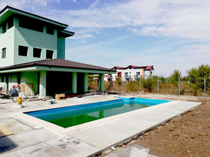 Construction d'une piscine de 48 mètres carrés pour un projet de maison thumbnail