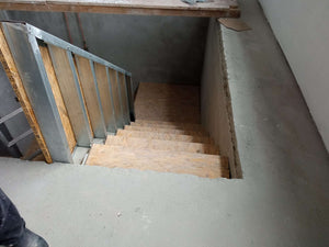 Construction d'un escalier intérieur pour le sous-sol d'une halle métallique
 thumbnail