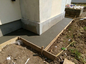 Construction de trottoirs périphériques pour un projet de maison à Saftica thumbnail