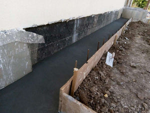 Construction de trottoirs périphériques pour un projet de maison à Saftica thumbnail