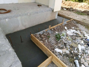 Construction de trottoirs périphériques pour un projet de maison à Saftica thumbnail