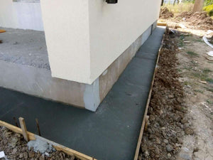 Construction de trottoirs périphériques pour un projet de maison à Saftica thumbnail