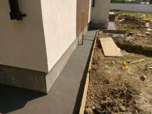 Construction de trottoirs périphériques pour un projet de maison à Saftica thumbnail