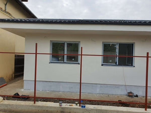 Façades finalisées avec un enduit décoratif siliconé et clôture pour une maison de plain-pied à Ilfov thumbnail