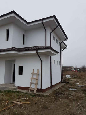 Construction des façades et du toit pour le projet de maison en métal de 260 mètres carrés thumbnail