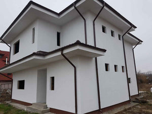 Construction des façades et du toit pour le projet de maison en métal de 260 mètres carrés thumbnail