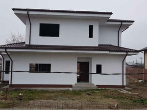 Construction des façades et du toit pour le projet de maison en métal de 260 mètres carrés thumbnail